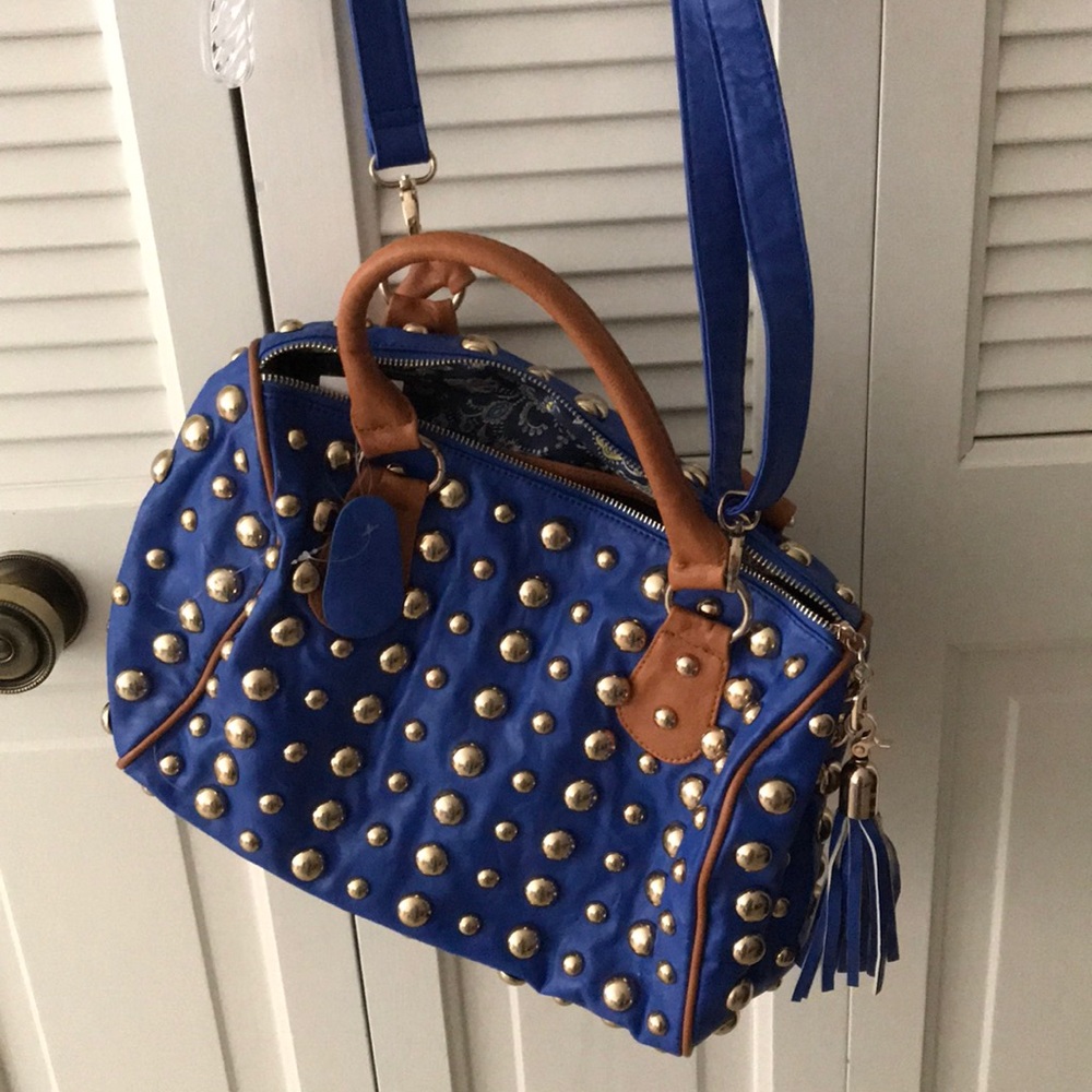 Blue purse w/ gold embellishments